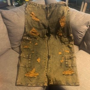 Orange distressed jeans